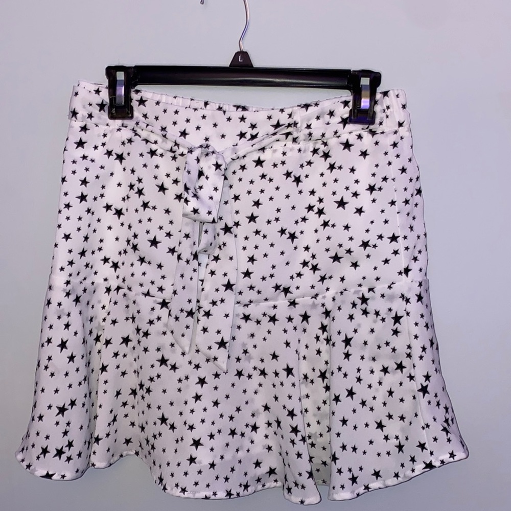 white skirt with black stars